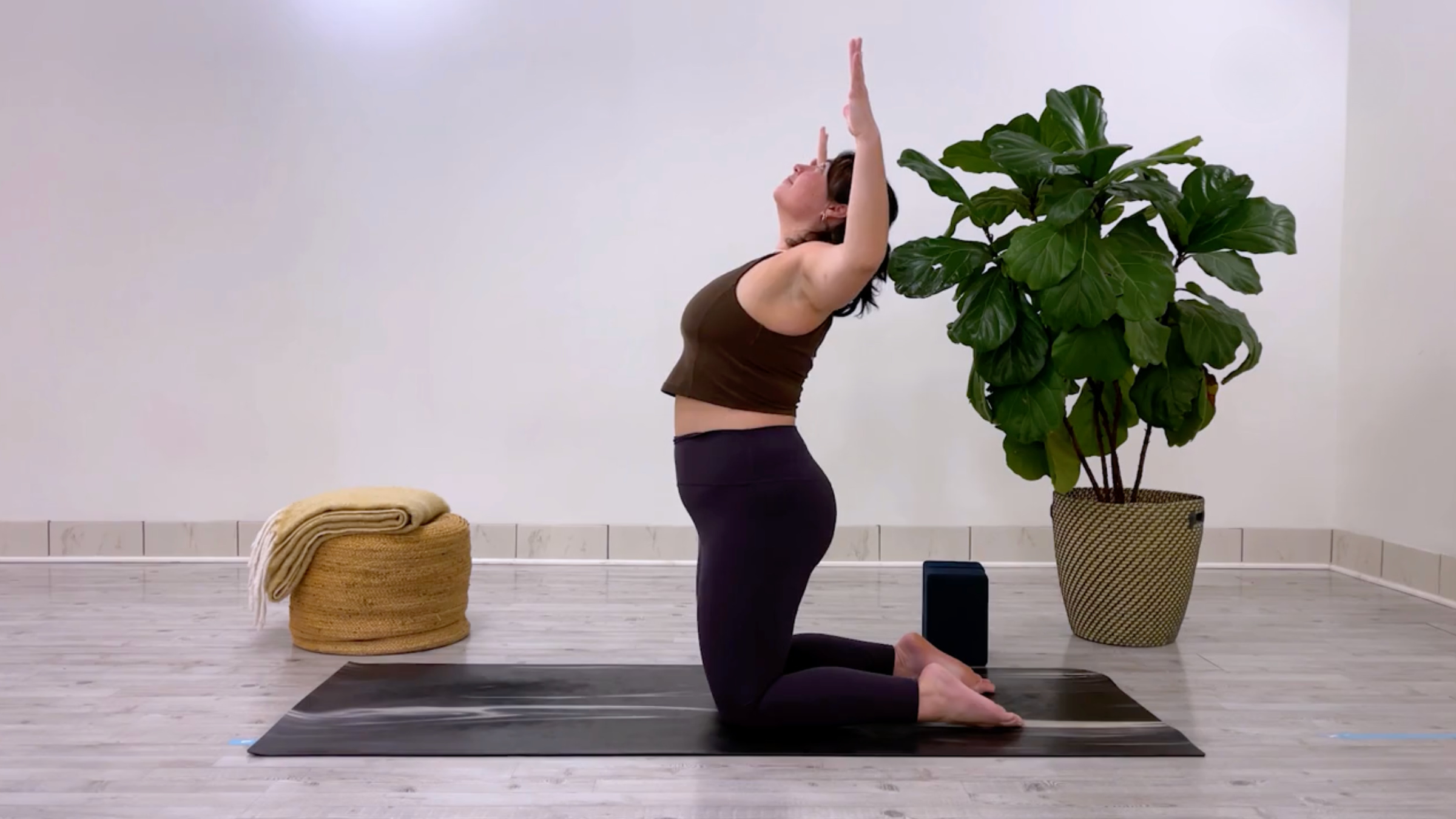Yoga for better posture: teacher Taylor Lorenz in Cactus Arms
